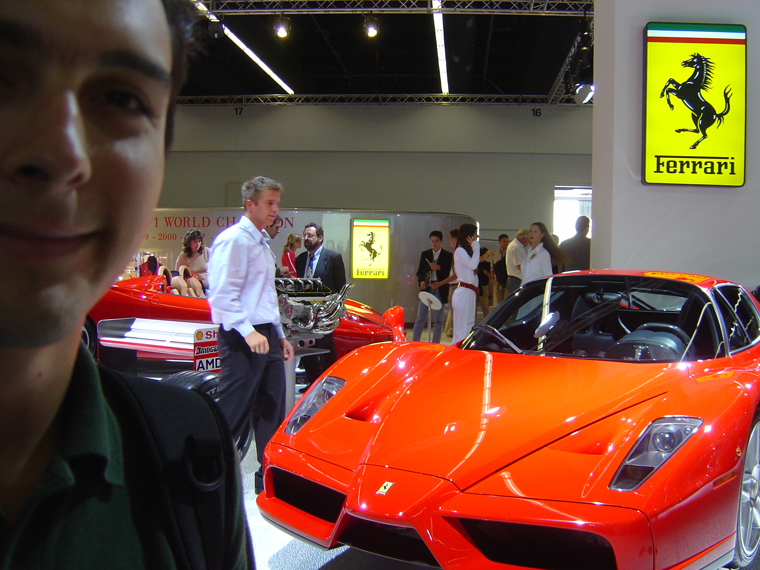 Nicolás beside a Ferrari Enzo